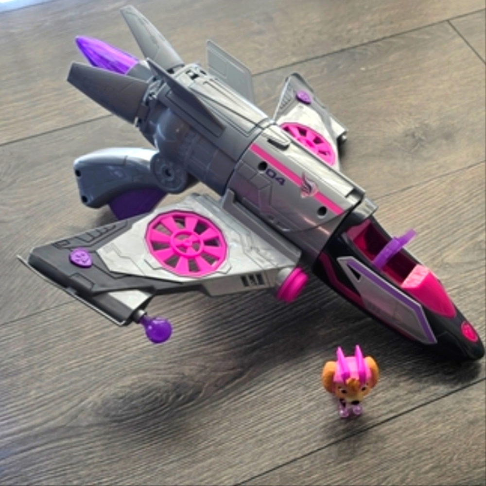 Transforming Jet Toy with Purple and Pink Accents